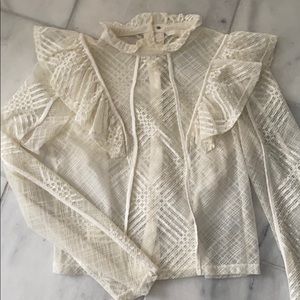 White top perfect condition. Button up back .